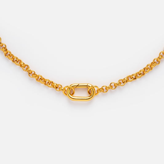 A close-up of the Gold Filled Charm Holder Necklace by Local Eclectic, featuring a prominent central oval link on an 18k yellow gold filled chain, displayed against a plain white background.