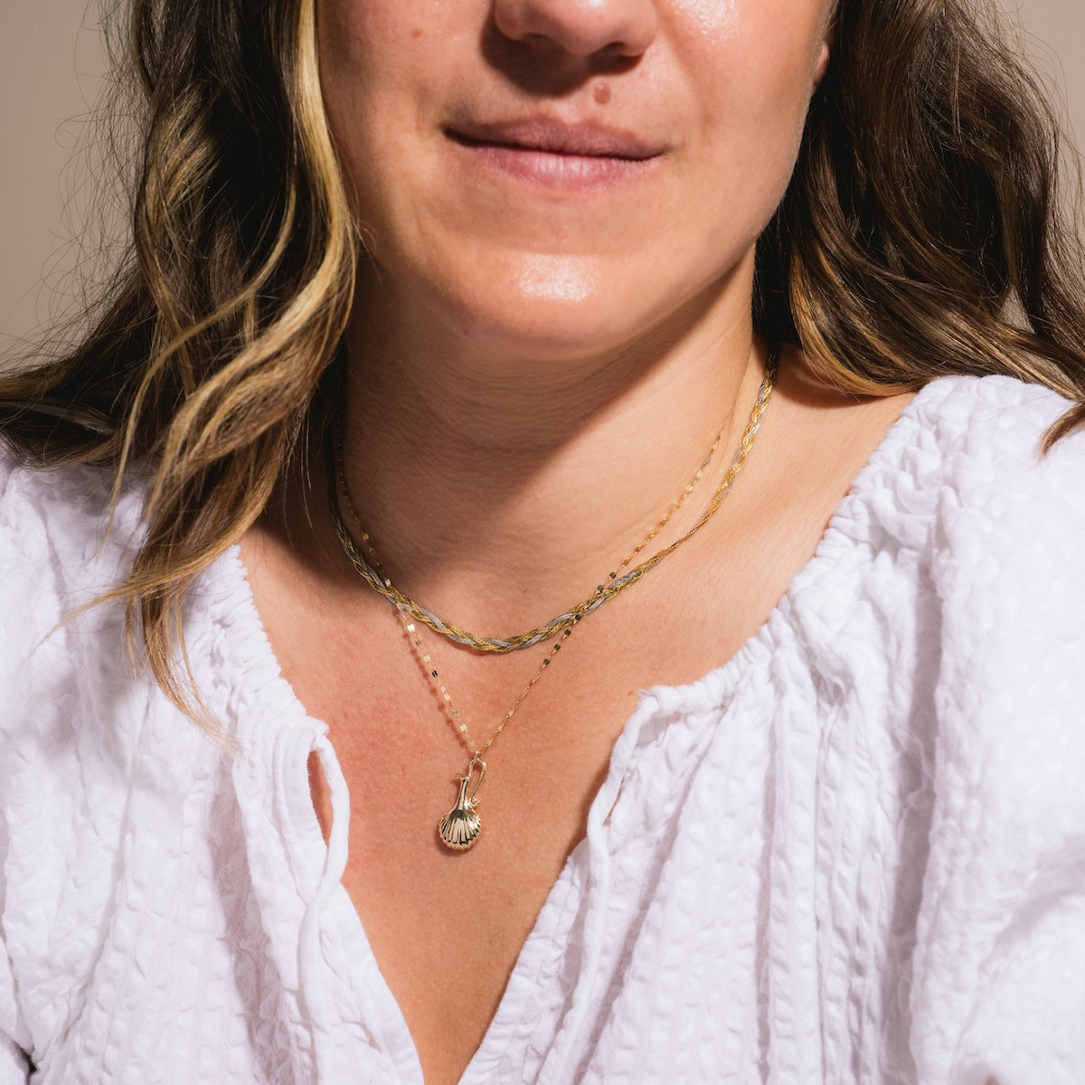Sofia Zakia Aphrodite Vessel Charm on necklace worn by model