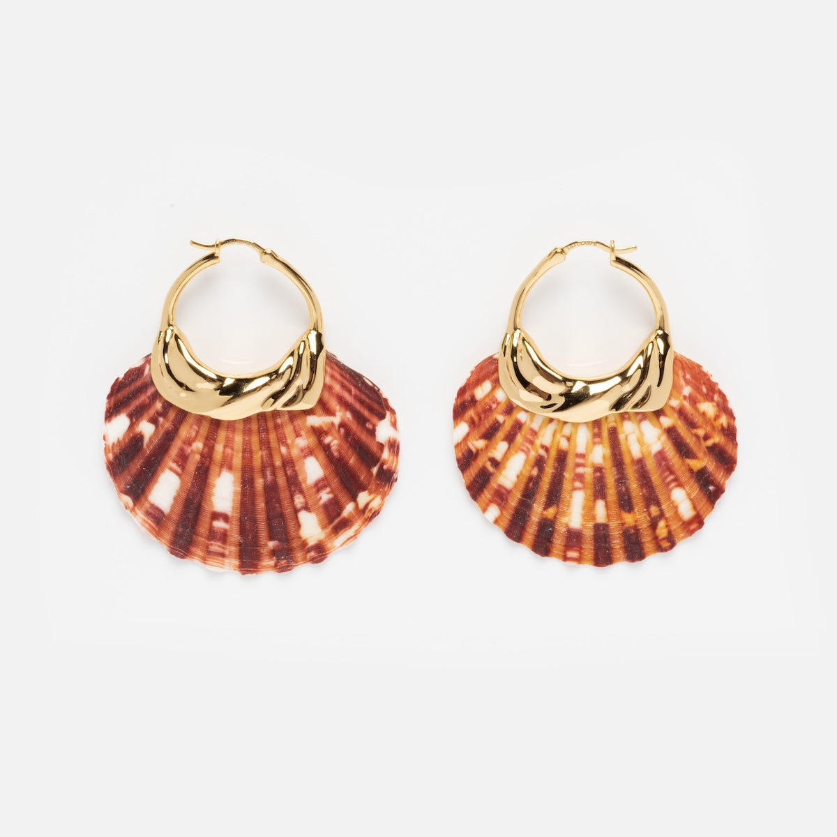 The Mira Earrings Sample are 14k gold plated hoops with brown and white natural shell charms, shown on a white background.