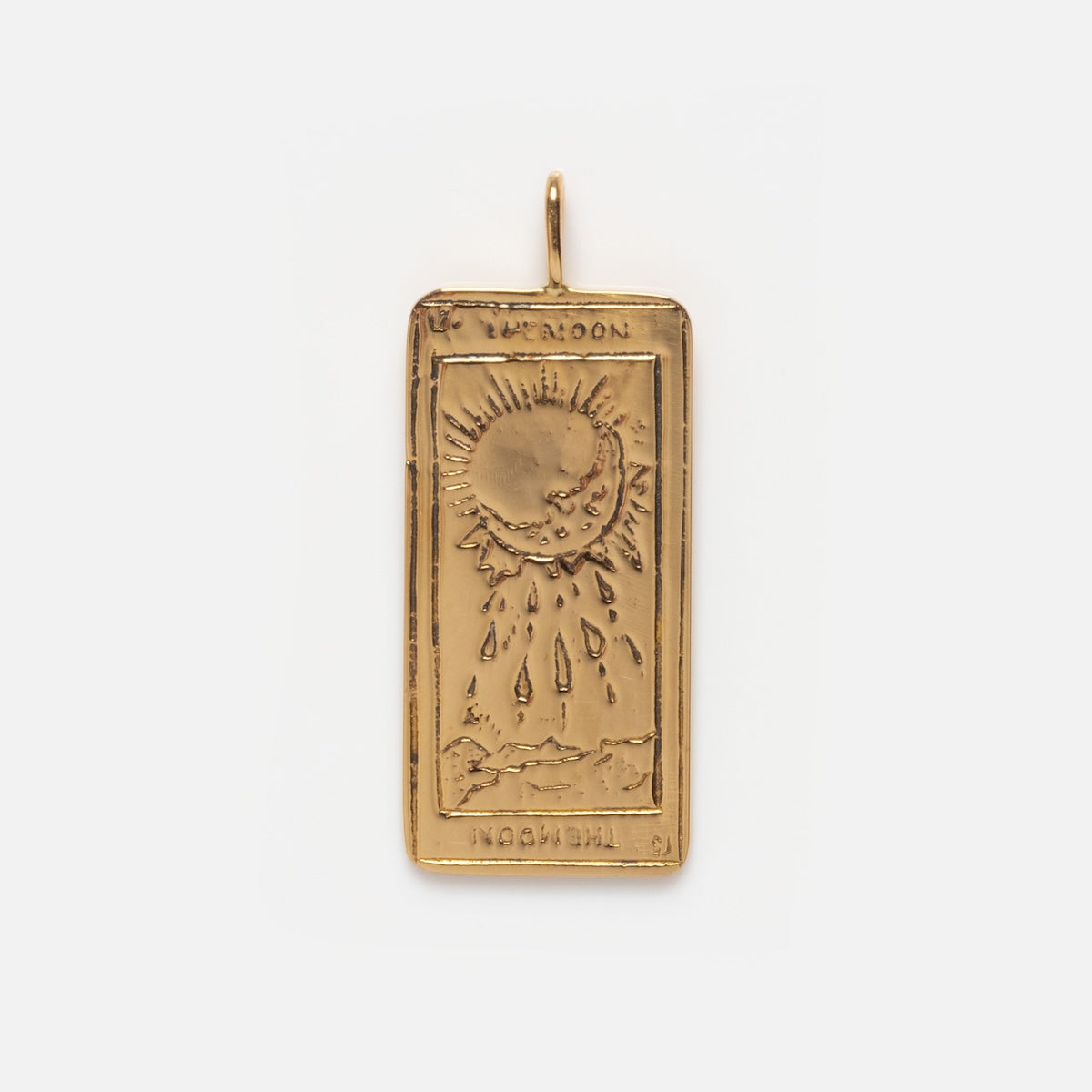 The Tarot Card Charm is a rectangular 14k solid gold piece engraved with sun, moon, raindrops, clouds, and landscape details, resembling a spiritual tarot card design labeled THE MOON.