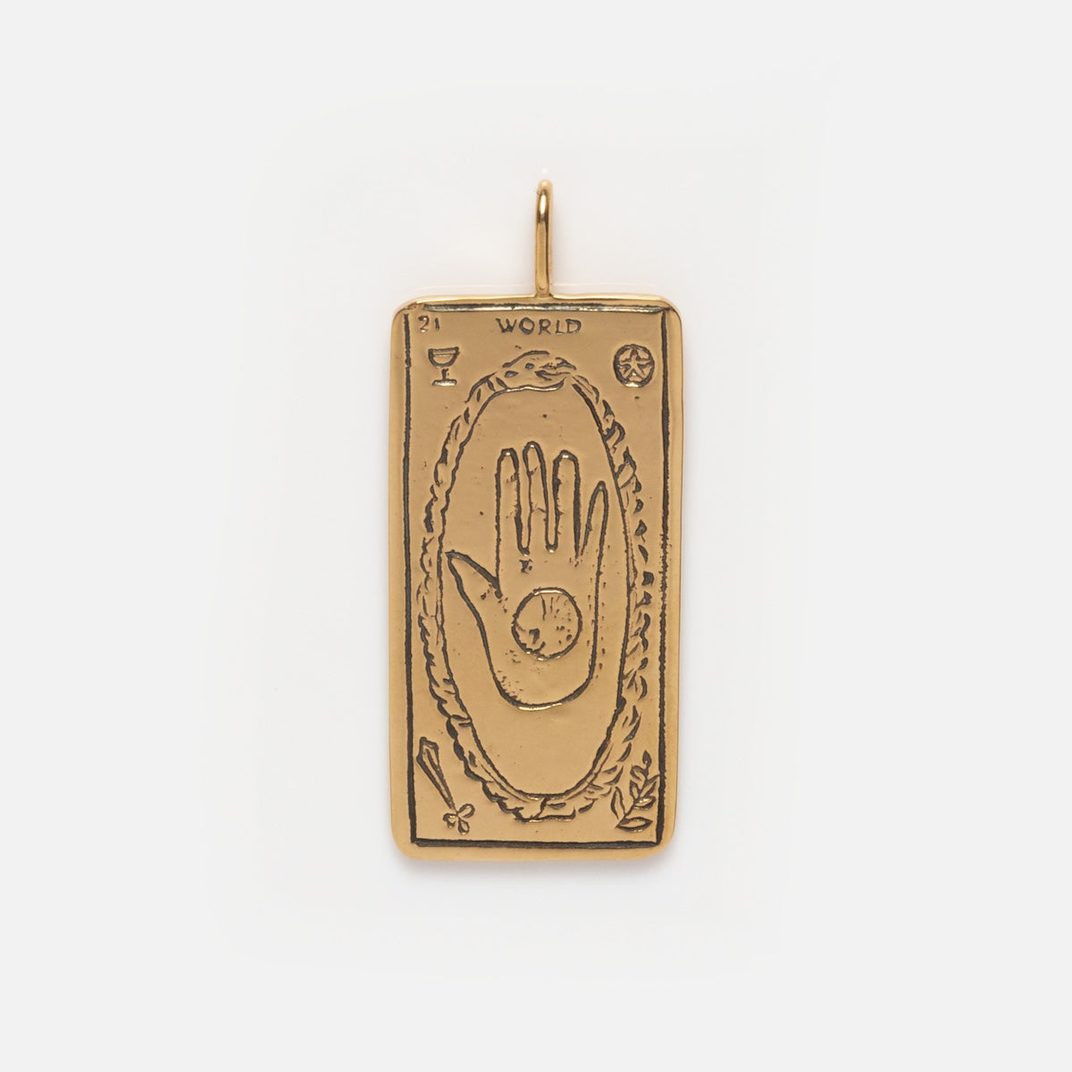 The Tarot Card Charm is a 14k solid gold rectangular pendant featuring an engraved tarot card design with an open hand, a circle in its palm, WORLD at the top, and symbolic icons in each corner—a unique spiritual jewelry piece.