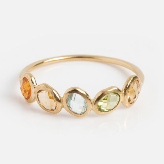 Exclusive to Local Eclectic, the Solid Gold Organic Dawn Ring showcases five bezel-set gemstones in orange, yellow, light blue, light green, and pale yellow—ideal for anyone wanting a vibrant gemstone ring.