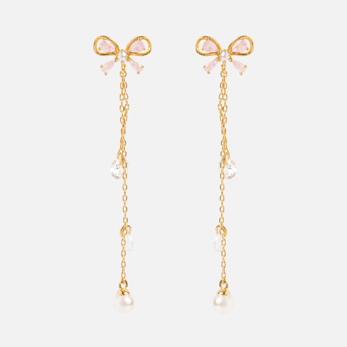 Princess Pearl Earrings Samples: 18k yellow gold plated dangle earrings featuring pink bow designs, gold chains, cubic zirconia accents, and luminous pearl beads at the bottom.