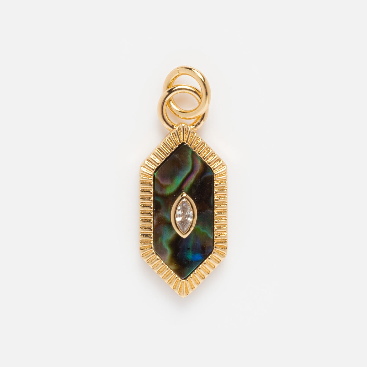 The Charms by Elizabeth Stone pendant features a hexagonal design with iridescent abalone shell, a marquise gemstone, textured 14k gold plating, and three gold loops at the top for a celestial look.