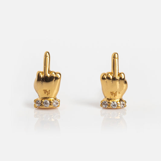 Meet the Boy Bye Earrings: gold plated studs shaped like hands with raised middle fingers, accented with clear cubic zirconia at the base—bold earrings designed to make a daring statement.