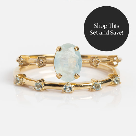 The Solid Gold 2025 March Capsule Aquamarine Ring Set features two sparkling rings and a free gift—perfect as a March birthstone jewelry set. Text bubble on the right reads, Shop This Set and Save!.