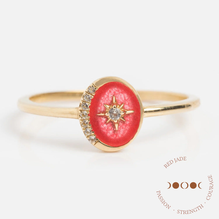 The Solid Gold Crystal Crescent Moon Ring for Manifestation features a round red jade stone, a star-shaped clear gemstone, and diamond accents—crafted in solid gold to channel passion, strength, and courage with natural crystals.