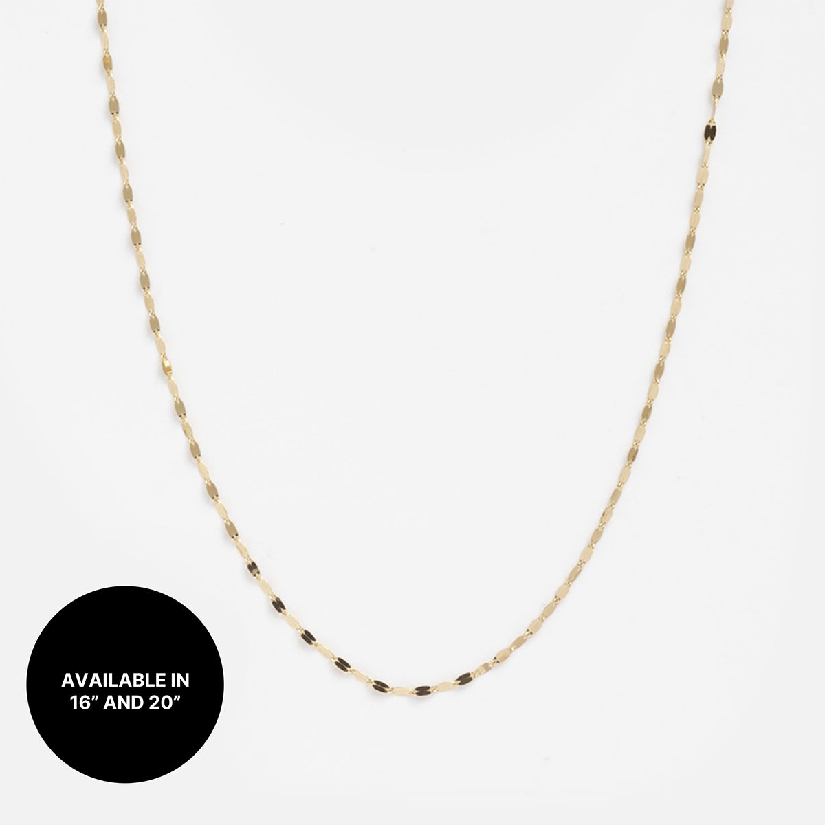 The Solid Gold Chain for Charms is shown on a white background, with a black circle that says “AVAILABLE IN 16 AND 20” in white text.