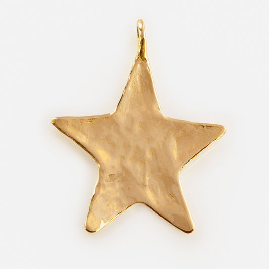 A hammered gold star-shaped pendant with a top loop, from the Luiny x Local Eclectic Charms collection, showcased on a plain white background—a stunning piece of jewelry.