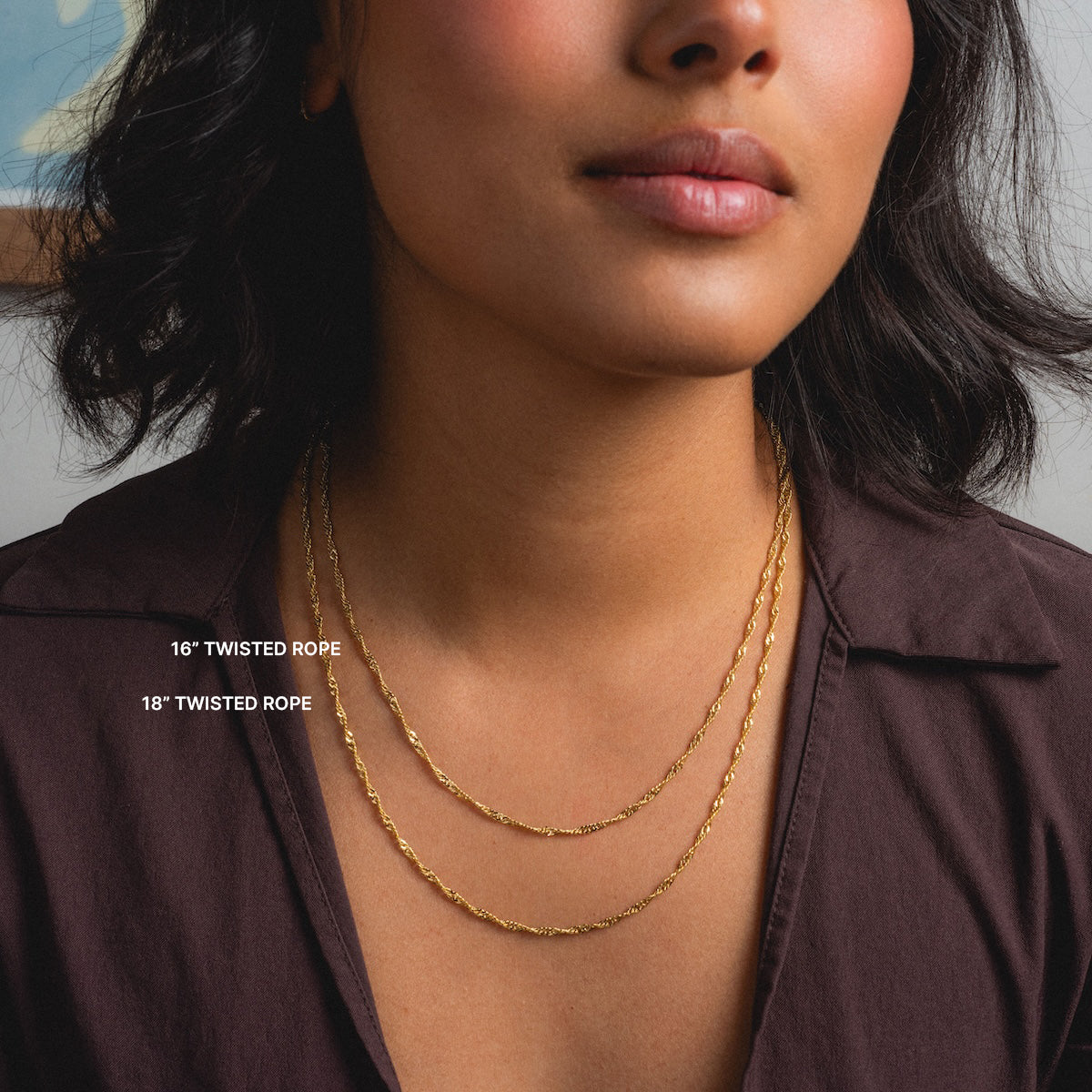 A person in a brown shirt models two Chain For Charms gold plated rope necklaces, one 16 and one 18, with text labels beside each necklace showing their sizes.
