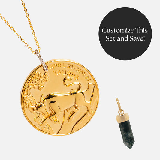 The Zodiac Coin and Crystal Charm Necklace Gift Set features a gold medallion with a black accent—perfect for astrology lovers or as a manifestation charm.