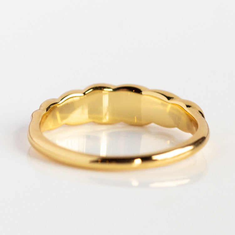 The Classic Opal Inlay Ring features a vintage-inspired scalloped top edge, crafted in 14k yellow gold plated metal with a smooth, shiny finish, and is displayed on a white background.