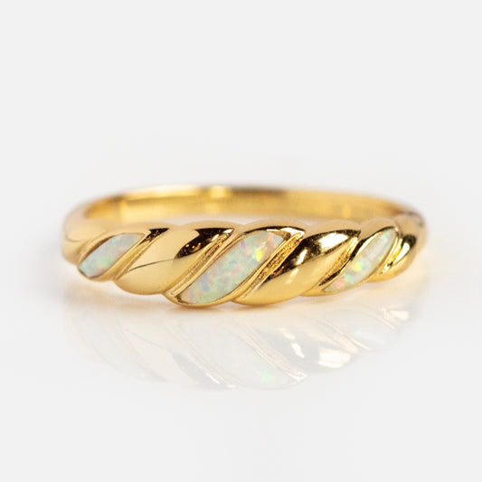 The Classic Opal Inlay Ring features a vintage-inspired twisted design in 14k yellow gold plating with alternating sections of shiny gold and shimmering simulated opal inlays, shown on a white background.