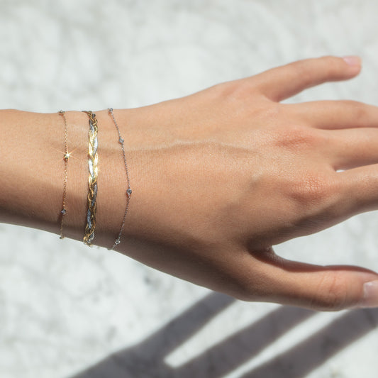 solid yellow and white gold bracelets for a mixed metal jewelry look