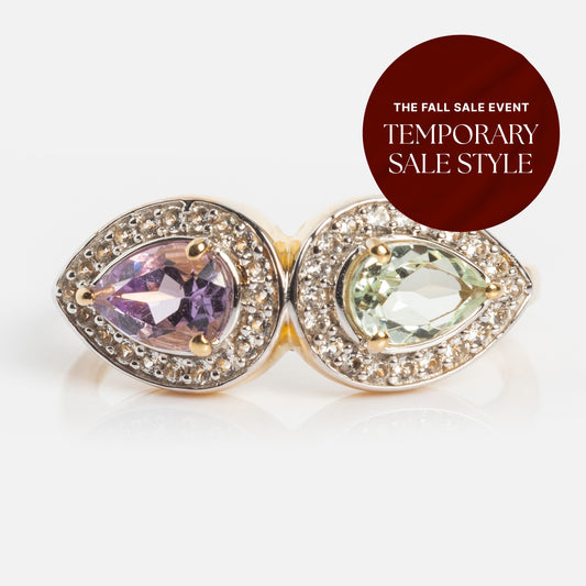 The 14k Pastel Amethyst Toi et Moi Ring features teardrop-shaped amethyst and light green gems, each accented by clear stones. A red label reads, The Fall Sale Event: Temporary Sale Style. Perfect as timeless heirloom jewelry.