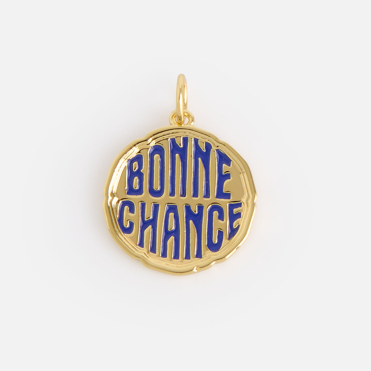 Charms by Mod and Jo gold round pendant features raised blue enamel letters spelling BONNE CHANCE on a white background, with a small top loop for attaching to a chain.