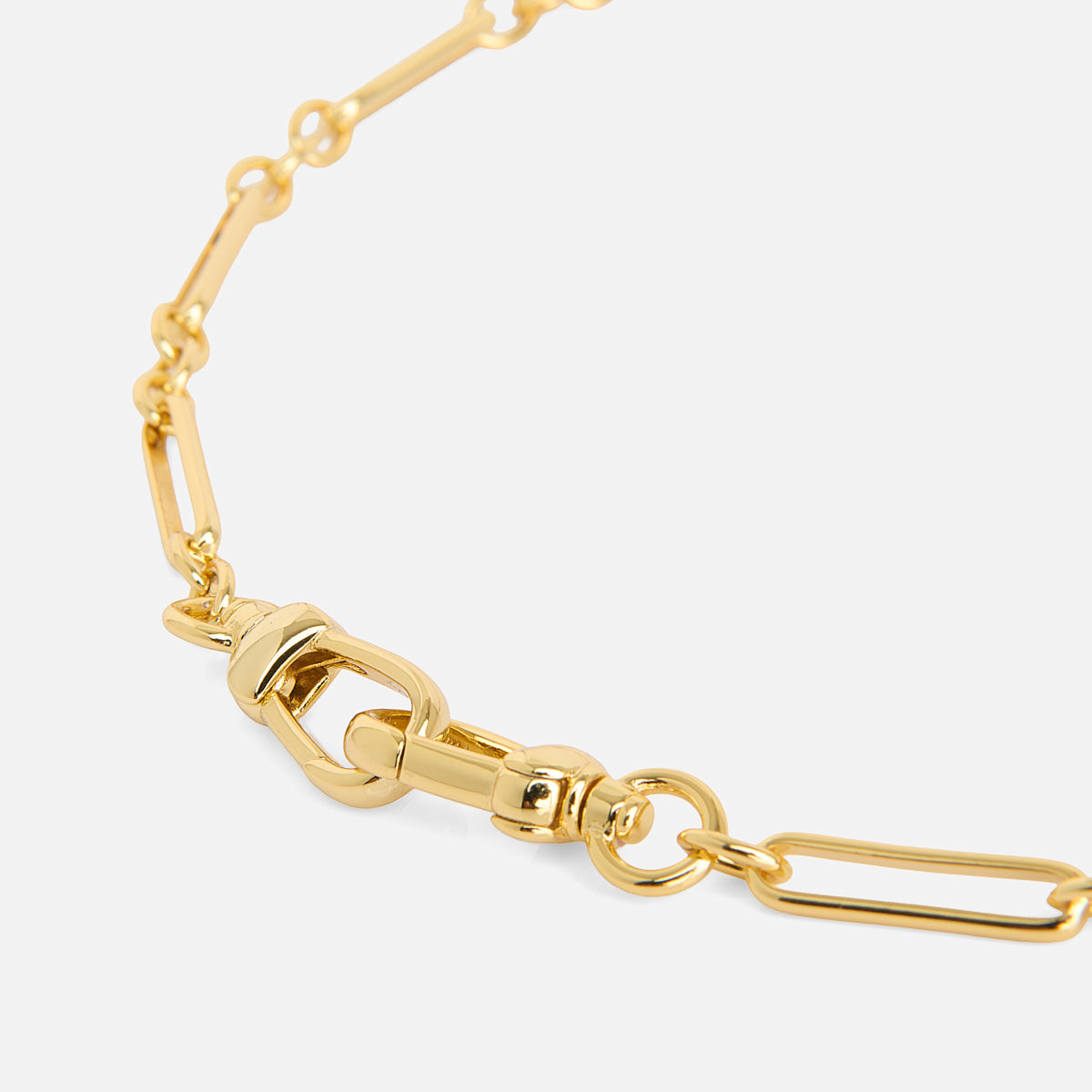 Close-up of the Liam Watch Chain Charm Holder Necklace, featuring elongated gold links and a distinctive chunky clasp, displayed on a plain white background.