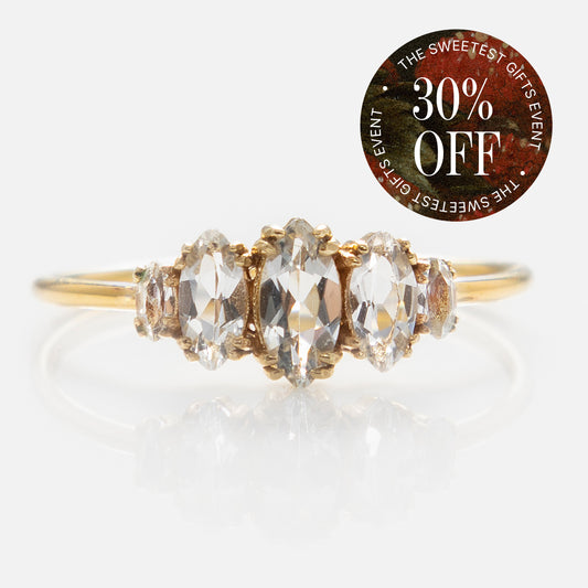 The Solid Gold Essential Marquise Cluster Ring, part of our Family Gold collection, is shown on a white background with a sticker in the top right corner reading "THE SWEETEST GIFTS EVENT 30% OFF" in white and red text.