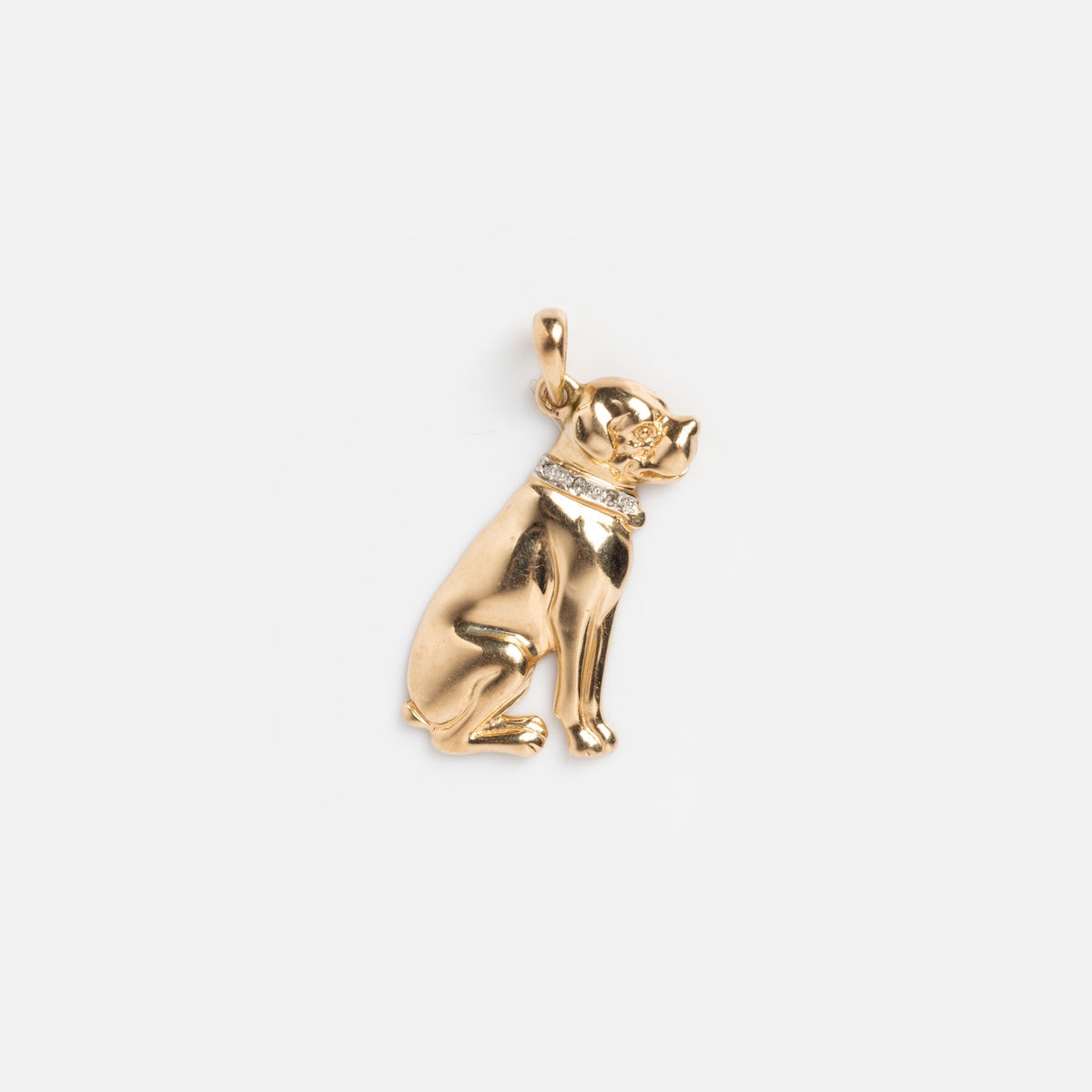 The Vintage 10k Dog Charm with Diamonds is a solid yellow gold dog pendant featuring a diamond-accented collar, shiny finish, and top loop for attaching to a chain, shown against a plain white background.
