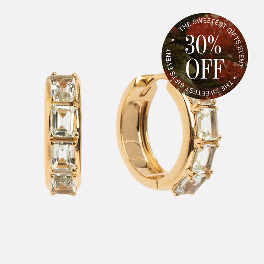 A pair of Green Amethyst Era Huggie Hoops in 14k gold vermeil with rectangular green amethyst gemstones, shown on a white background. A circular sticker at the top right says THE SWEETEST GIFTS EVENT 30% OFF in white and red.