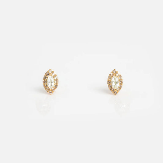 The Green Amethyst Marquise Muse Studs are vintage-inspired 14k gold vermeil earrings with marquise shapes, each featuring a central green amethyst surrounded by sparkling stones, shown on a white background.