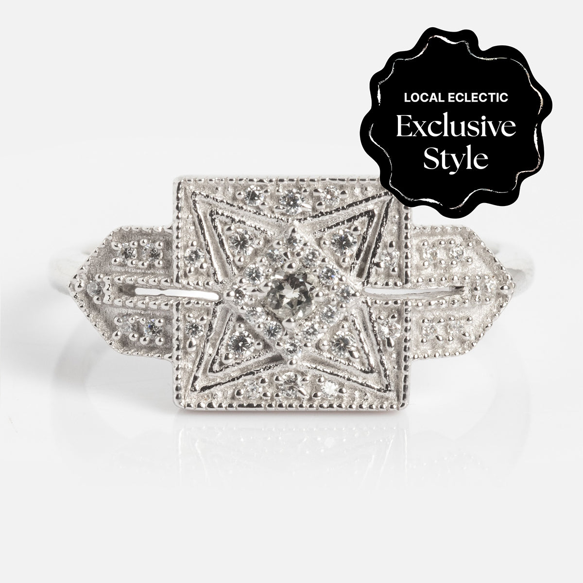Decorative star-shaped object with rhinestones on a white background, featuring 'Local Eclectic Exclusive Style' label.