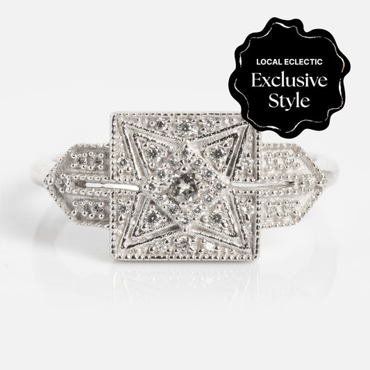 Decorative star-shaped object with rhinestones on a white background, featuring 'Local Eclectic Exclusive Style' label.