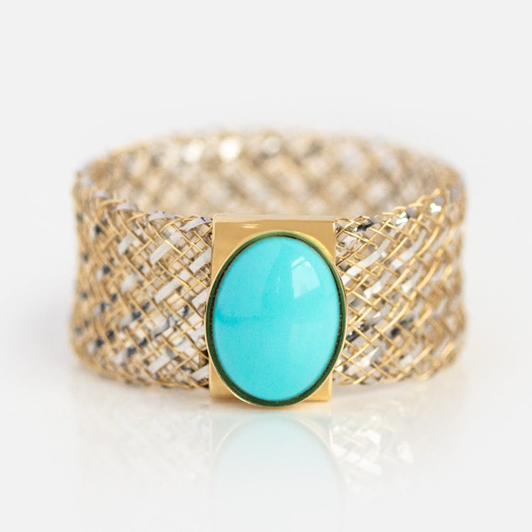 The Solid Gold Mesh Gemstone Ring Turquoise, sample size 7, showcases an oval turquoise stone set in a smooth 9k yellow gold bezel atop a wide mesh band, shown on a plain white background.