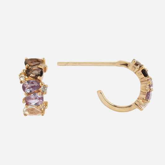 Close-up of Solid Gold Ombre Birthstone Huggie Hoops, crafted in 9k gold and accented with small purple, pink, and brown gemstones along the front for a vibrant birthstone earrings look.