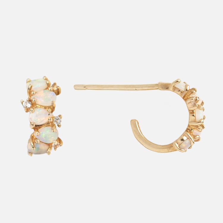 Solid Gold Ombre Birthstone Huggie Hoops Opal Sample: 9k yellow gold hoops featuring oval opals, white topaz, and clear crystals, displayed from side and front angles on a white background.