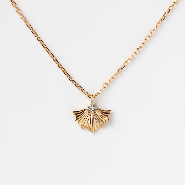 Solid Gold Ginkgo Leaf Diamond Necklace Sample featuring a delicate 9k solid yellow gold chain and a fan-shaped ginkgo leaf pendant with a sparkling diamond at the center, displayed on a white background.
