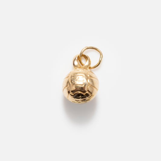 The Vintage 14k Tiny Ball Charm is a small, shiny solid yellow gold soccer ball charm with subtle engraved lines and a top loop, perfect for attaching to a chain or bracelet and adding vintage flair to your jewelry collection.