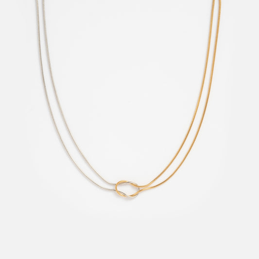 The Solid Gold Mixed Metal Knotted Necklaces Sample features intertwined silver and gold necklaces forming a small knot at the center, displayed on a plain white background.