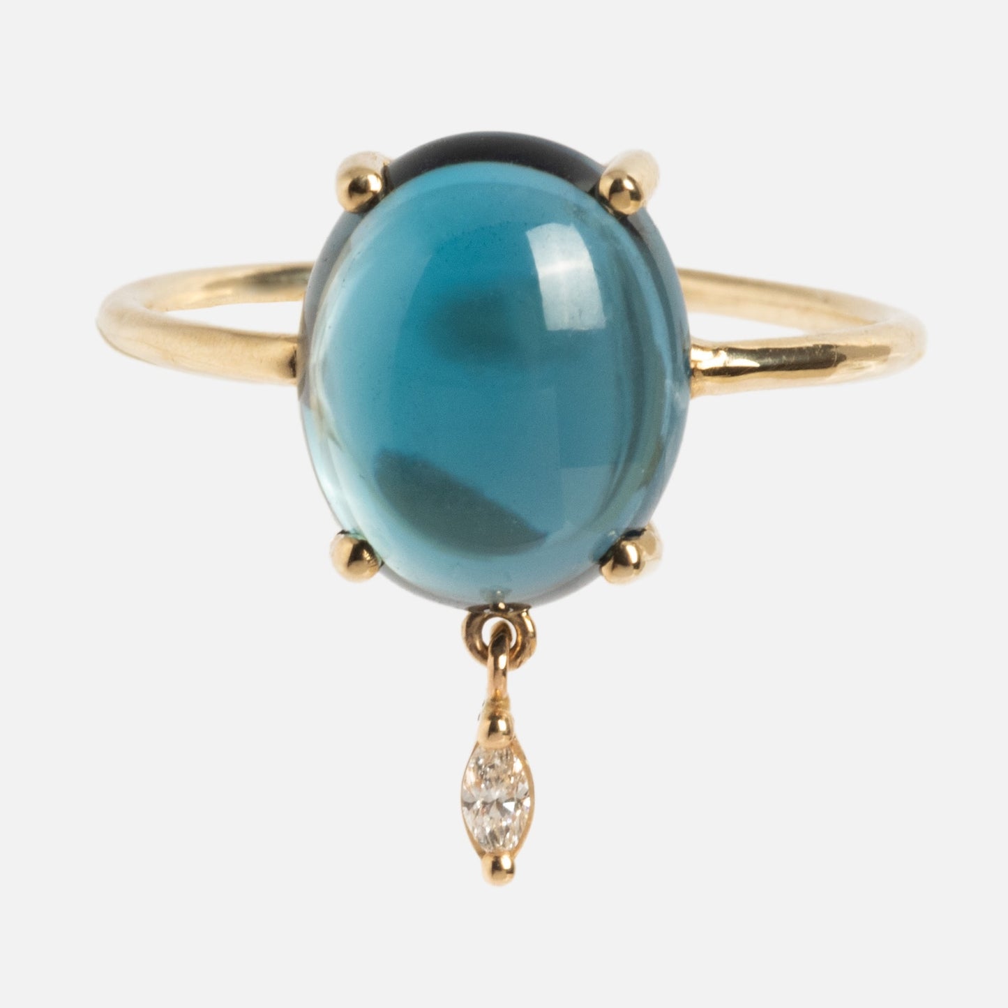 The One of a Kind 14k London Blue Topaz with Diamond Dangle Ring features a large oval blue topaz in a prong setting and a marquise-shaped diamond charm that dangles below the gemstone.