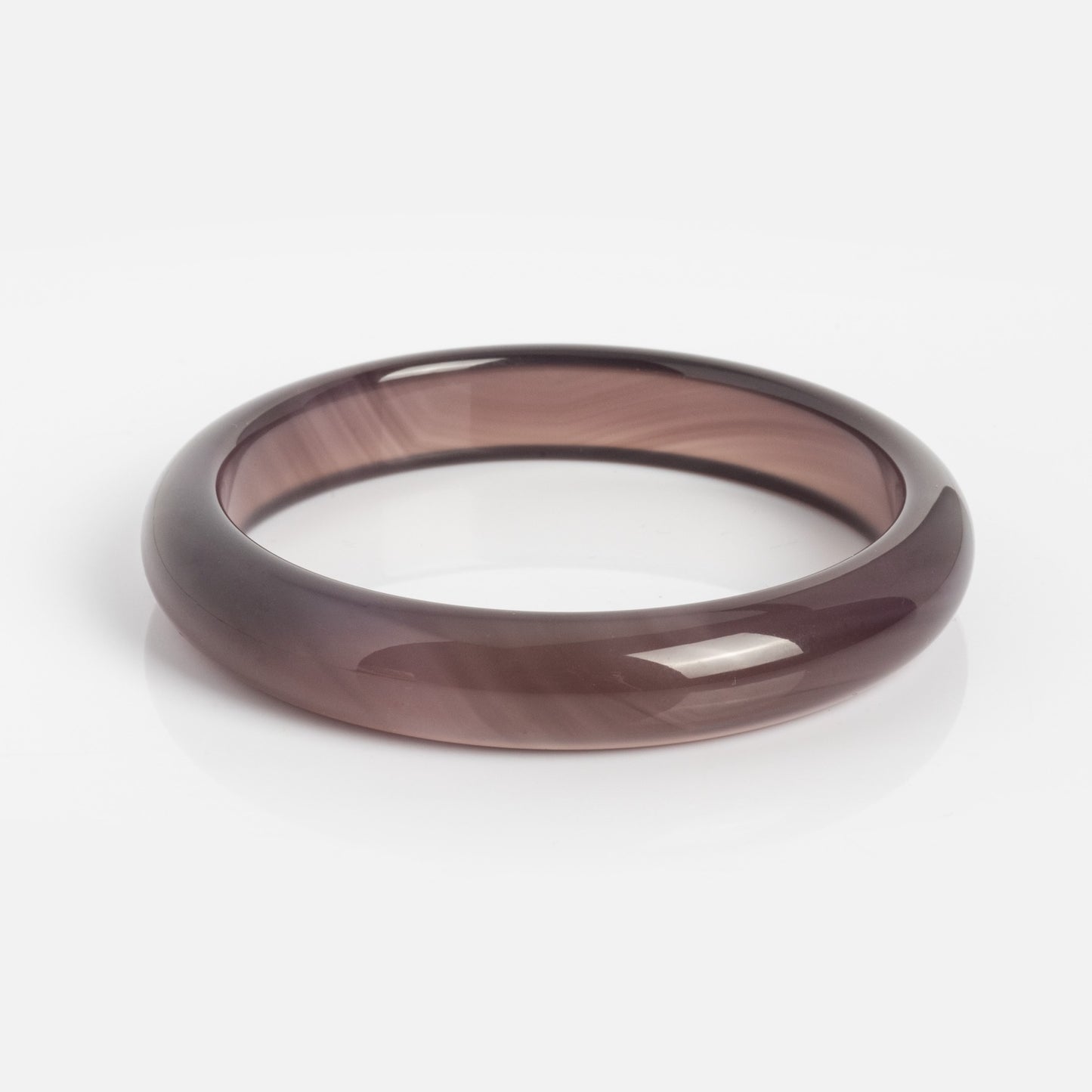 The Moon Purple Jade Stone Bangle, featuring a glossy, translucent brown finish, smooth rounded edges, and an 11 mm width, is displayed on a white background.