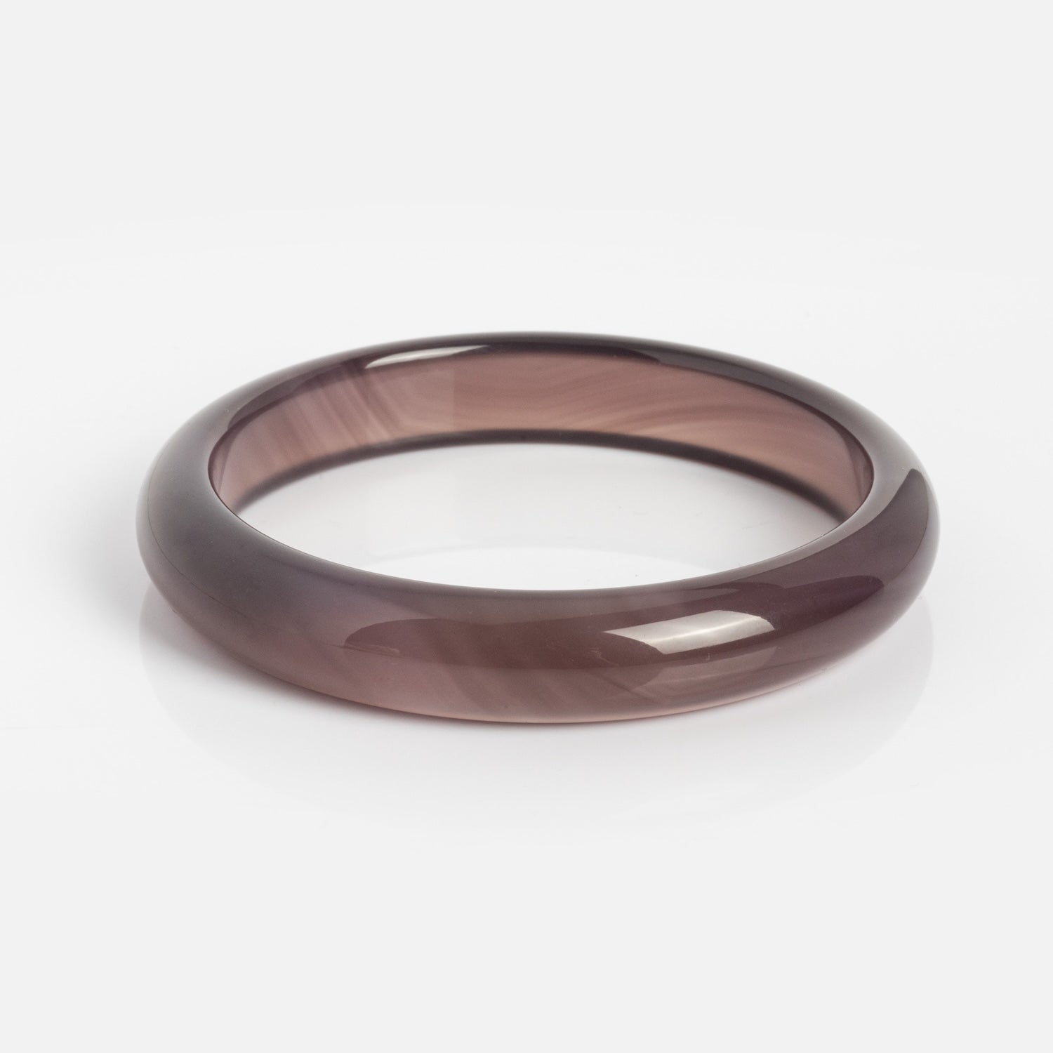 The Moon Purple Jade Stone Bangle, featuring a glossy, translucent brown finish, smooth rounded edges, and an 11 mm width, is displayed on a white background.