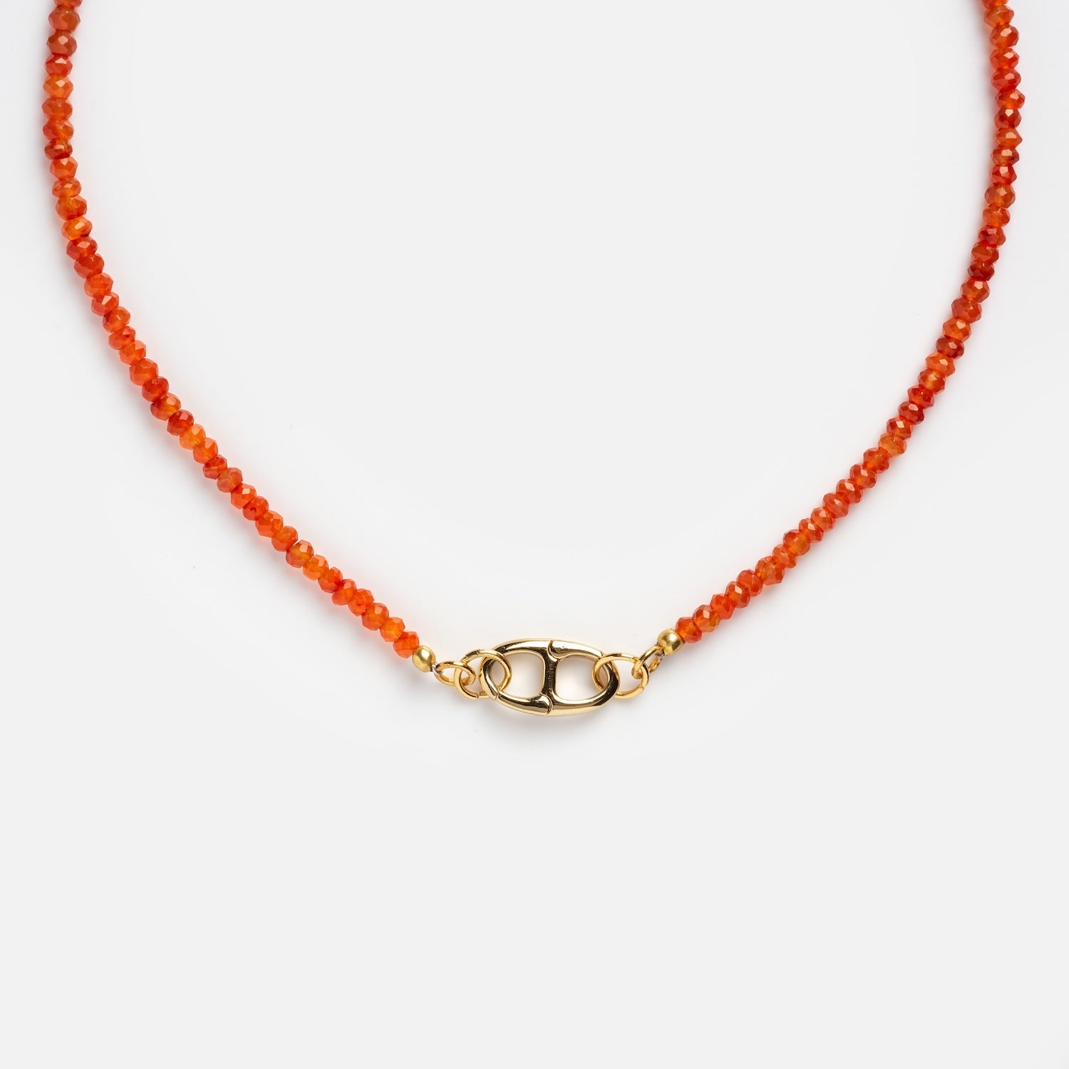 A close-up of the Customizable Beaded Gemstone Charm Holder Necklace, featuring small, round orange beads and a gold clasp, displayed on a white background.