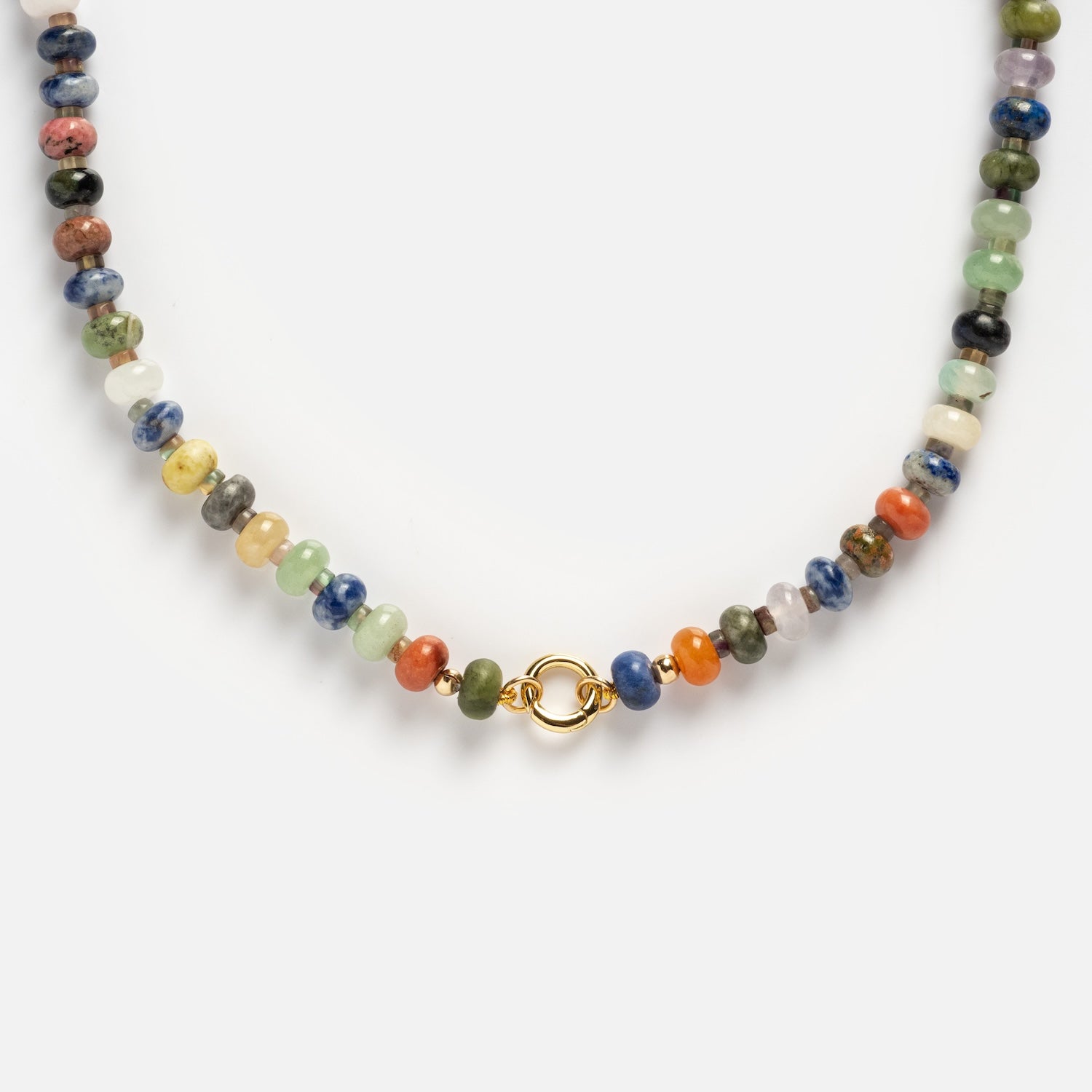 The Macey Customizable Beaded Charm Holder Necklace showcases small, round, multicolored beads and a gold spring ring clasp at the center, displayed on a plain white background.