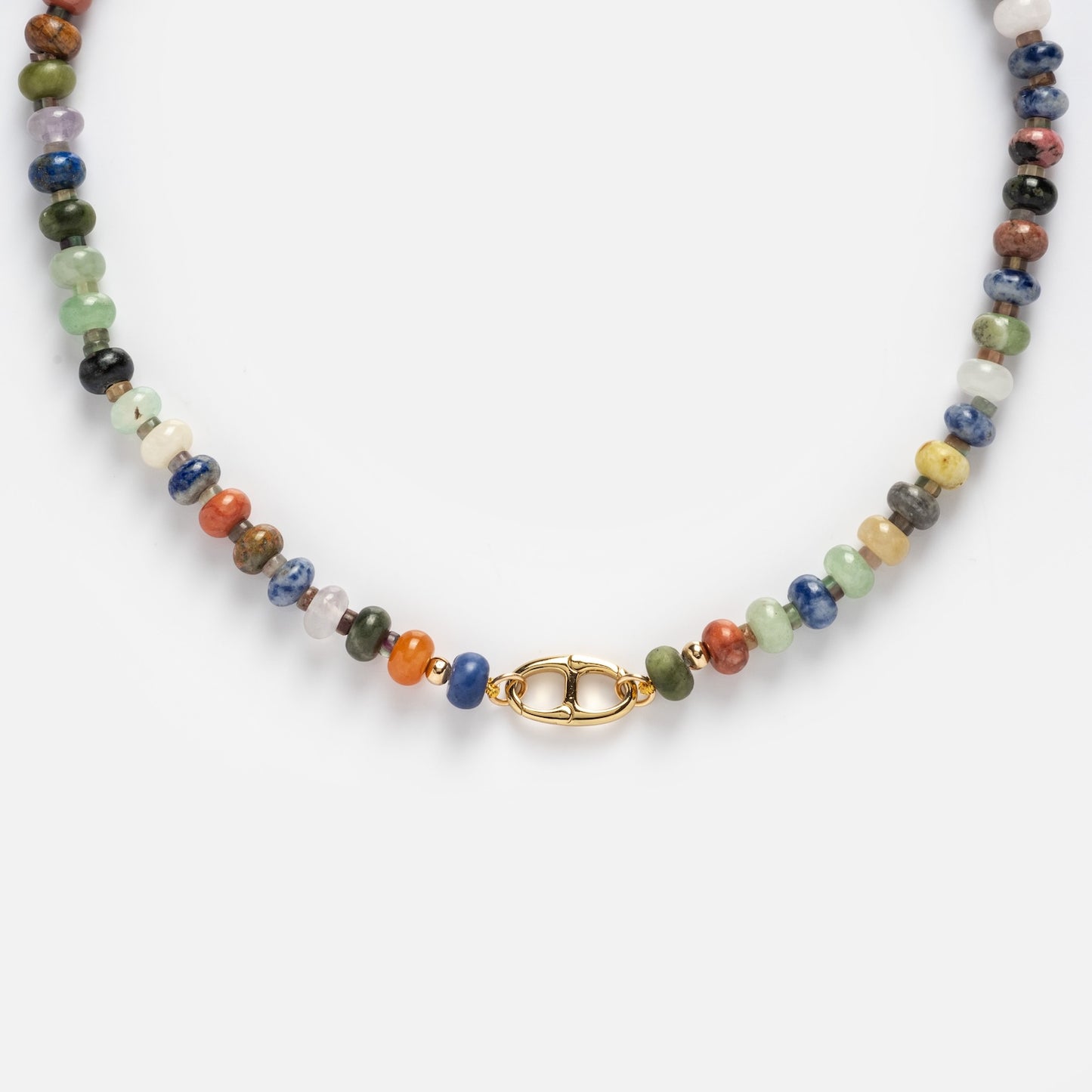The Macey Customizable Beaded Charm Holder Necklace features multicolored round stones and a gold lobster clasp, displayed against a plain white background.