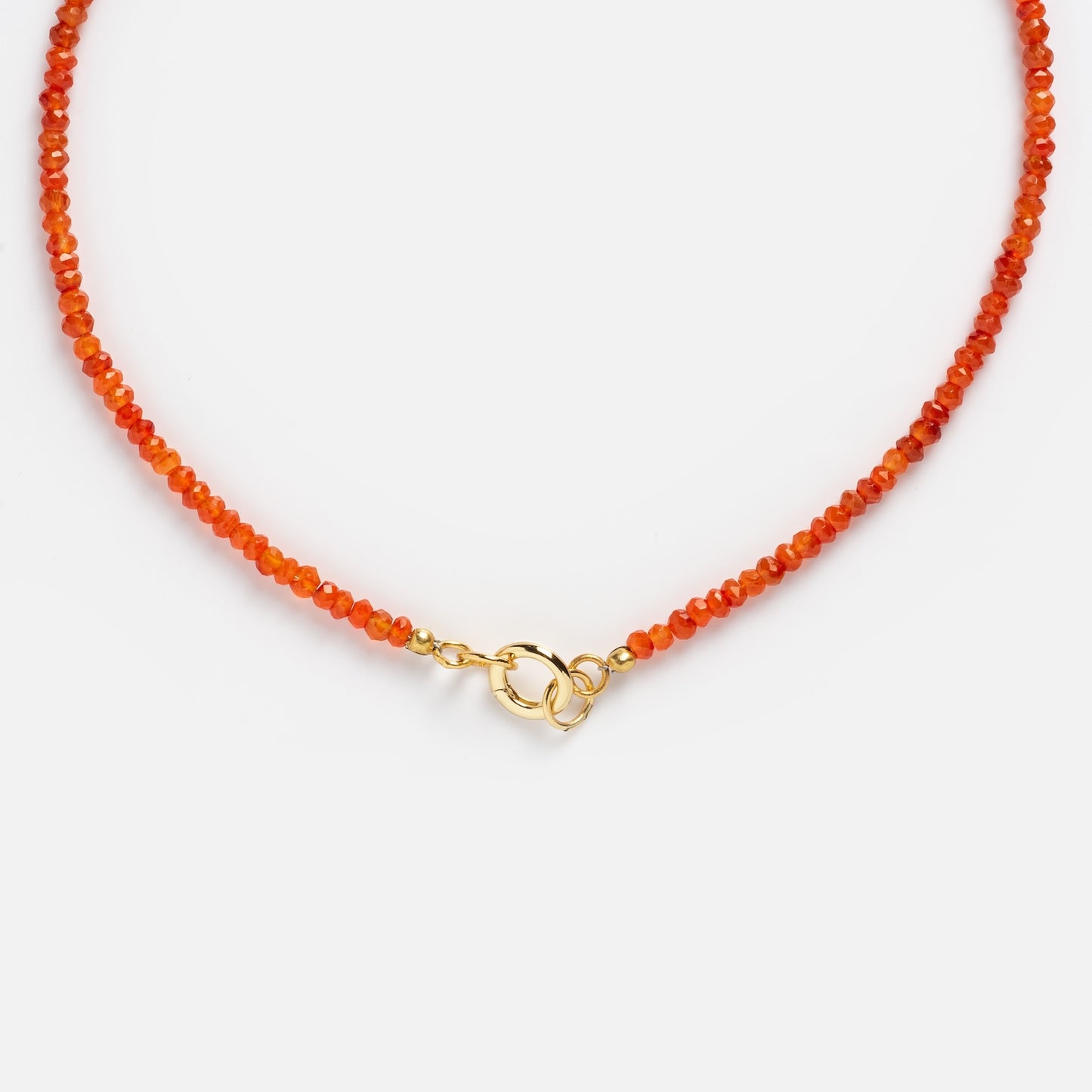 A close-up of the Customizable Beaded Gemstone Charm Holder Necklace featuring orange beads and a gold lobster clasp, displayed on a white background.