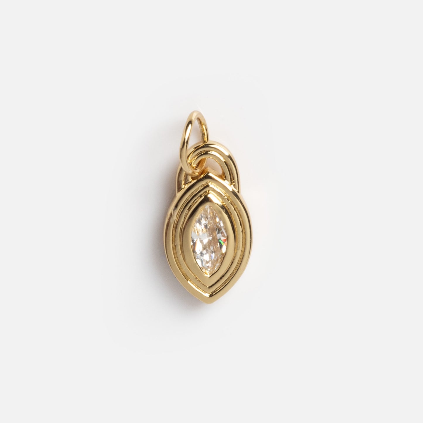 The Monroe Birthstone Charm features a marquise-cut clear gemstone set at the center and surrounded by concentric gold frames, displayed against a plain white background.