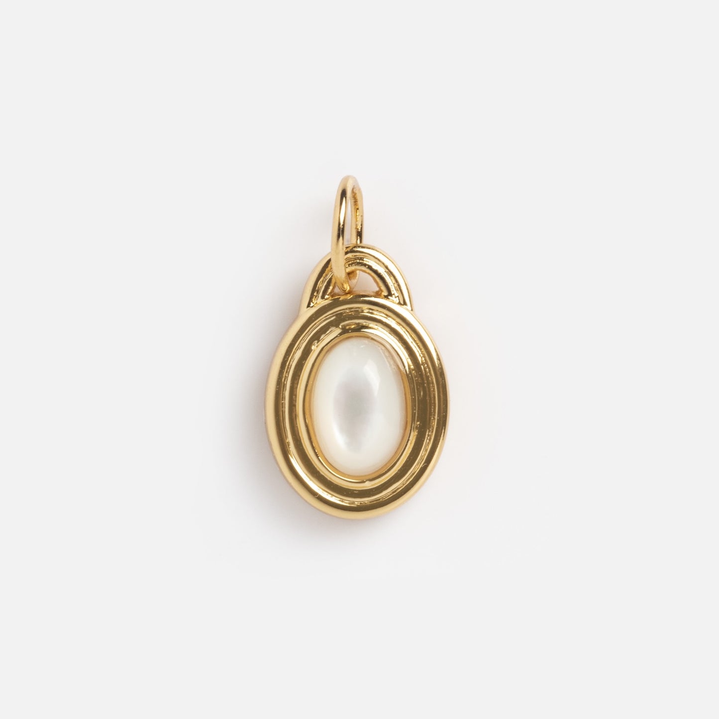 The Monroe Birthstone Charm is a gold oval pendant with a white pearl-like center and a small gold loop for attaching to a chain, displayed on a plain white background.