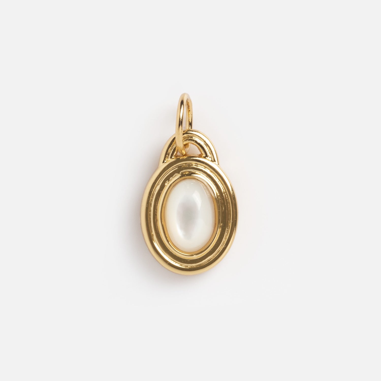 The Monroe Birthstone Charm is a gold oval pendant with a white pearl-like center and a small gold loop for attaching to a chain, displayed on a plain white background.