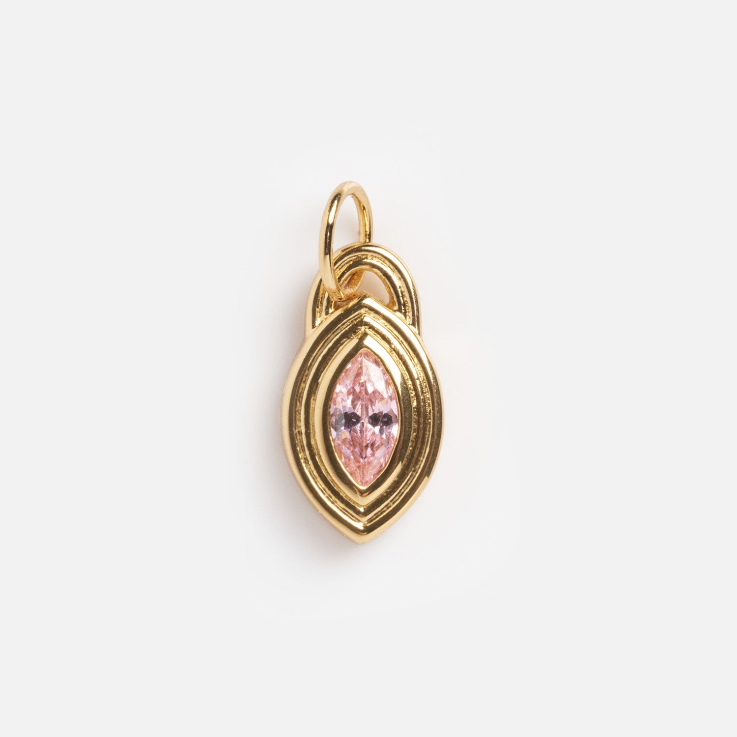 The Monroe Birthstone Charm features a marquise-shaped pink gemstone at its center, framed by concentric gold outlines and a small top loop for easy attachment to a necklace or bracelet.