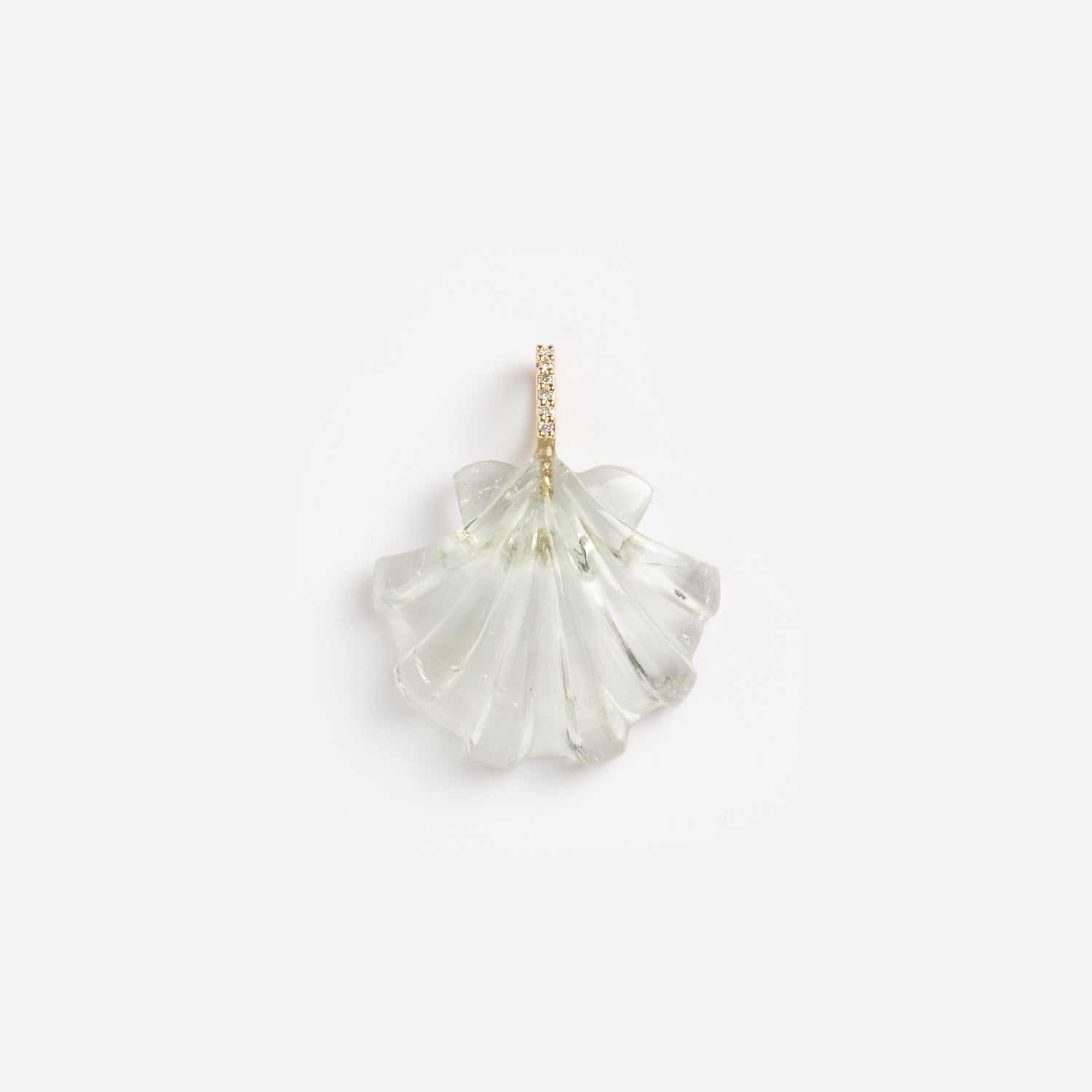 A fan-shaped 14k gold Scallop Shell Charm featuring green amethyst and diamond accents, set against a plain white background.