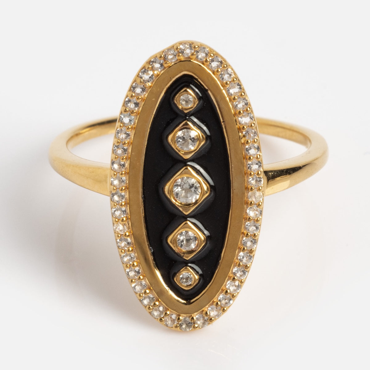 The Vintage Inspired Dazzling Navette Ring (Sample Size 7) features four diamonds on a black center in an elongated oval face, bordered by sparkling white CZ stones set in 14k yellow gold vermeil over silver.