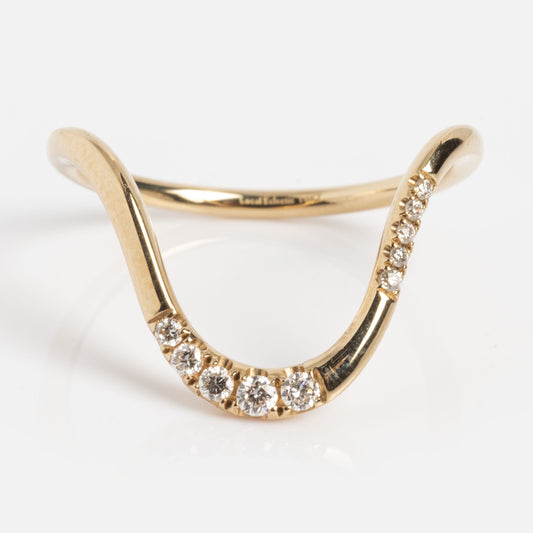 The Solid Gold Diamond Valley Band Sample Size 7 is a 14k yellow gold V-shaped ring with small round lab diamonds set along the front curve, shown on a plain white background.