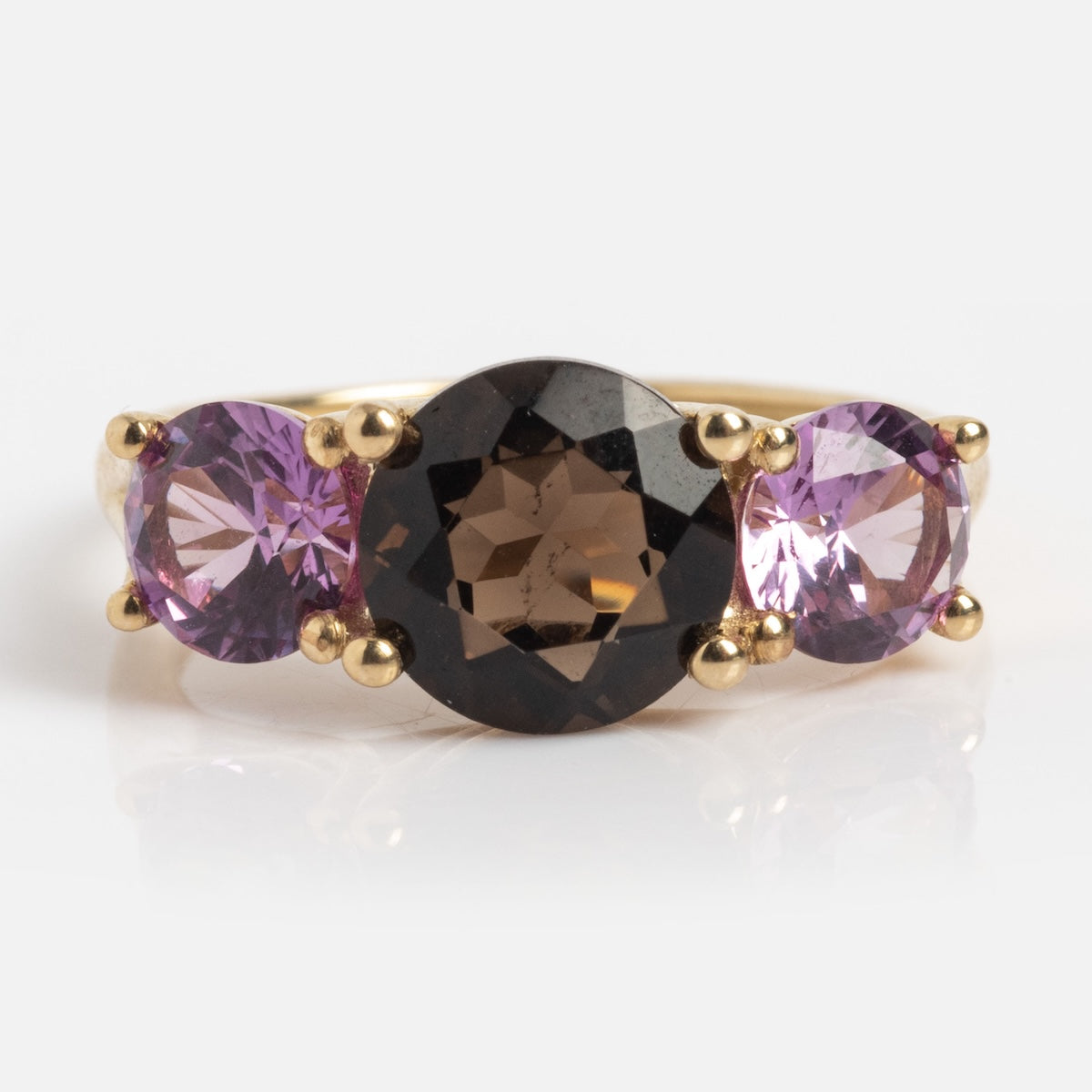 The Solid Gold Trilogy Birthstone Pinky Ring Alexandrite (Sample Size 5) features a central large round smokey quartz flanked by two smaller round lab Alexandrite stones, all set in claw settings.
