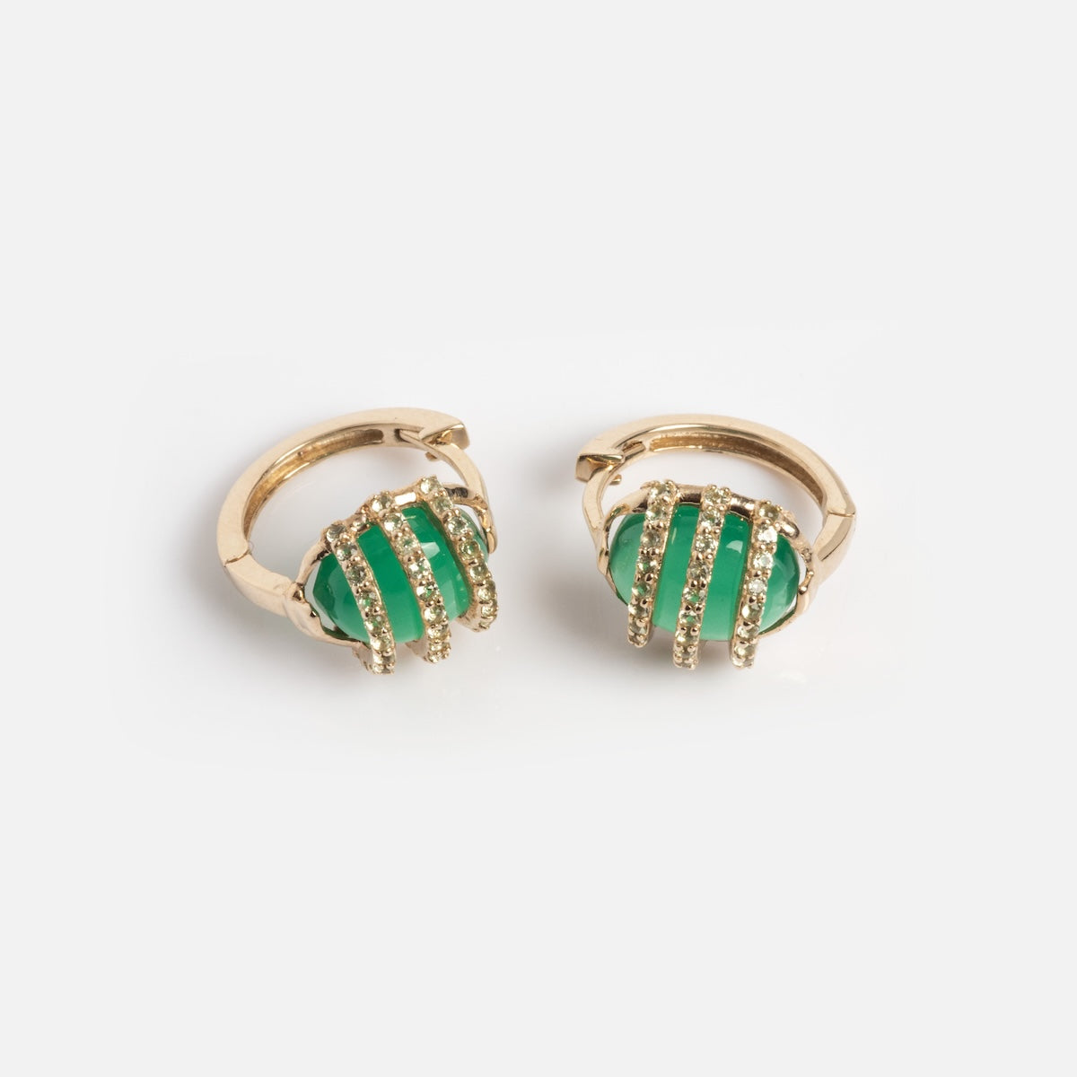 Solid Gold Green Agate Caged Huggie Hoops 2 Sample: A pair of earrings with green agate gemstones set in 9k solid gold prongs, accented by small crystals, shown on a white background.