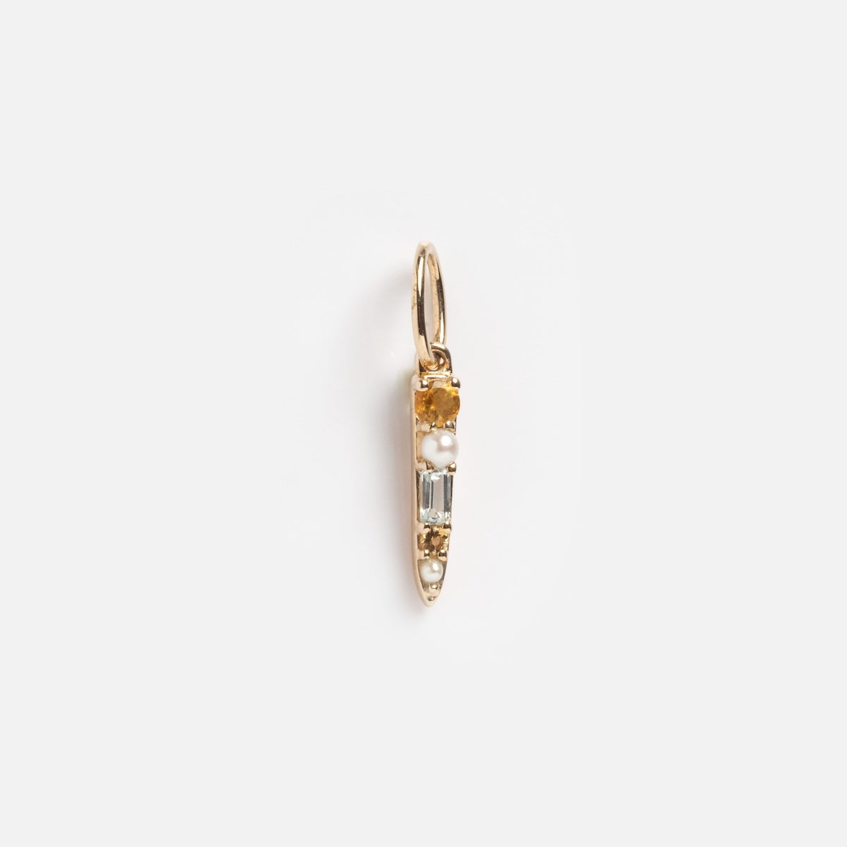 The Solid Gold Tanzanite and Citrine Bar Drop Charm features a pointed drop shape with a small pearl, a rectangular tanzanite gemstone, and a round citrine set vertically.